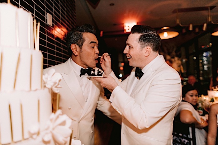 Husband and husband eating cake