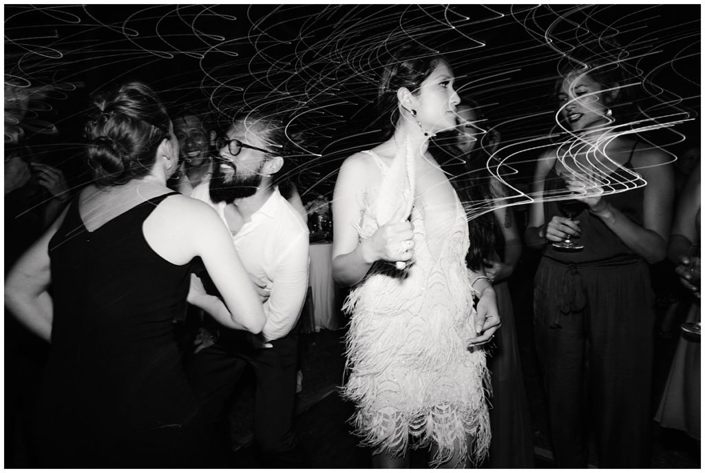fun with sparkling lights during a reception in Bali