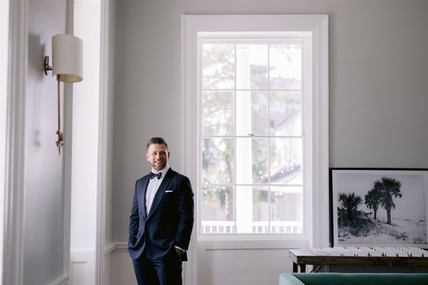 groom smiling before wedding