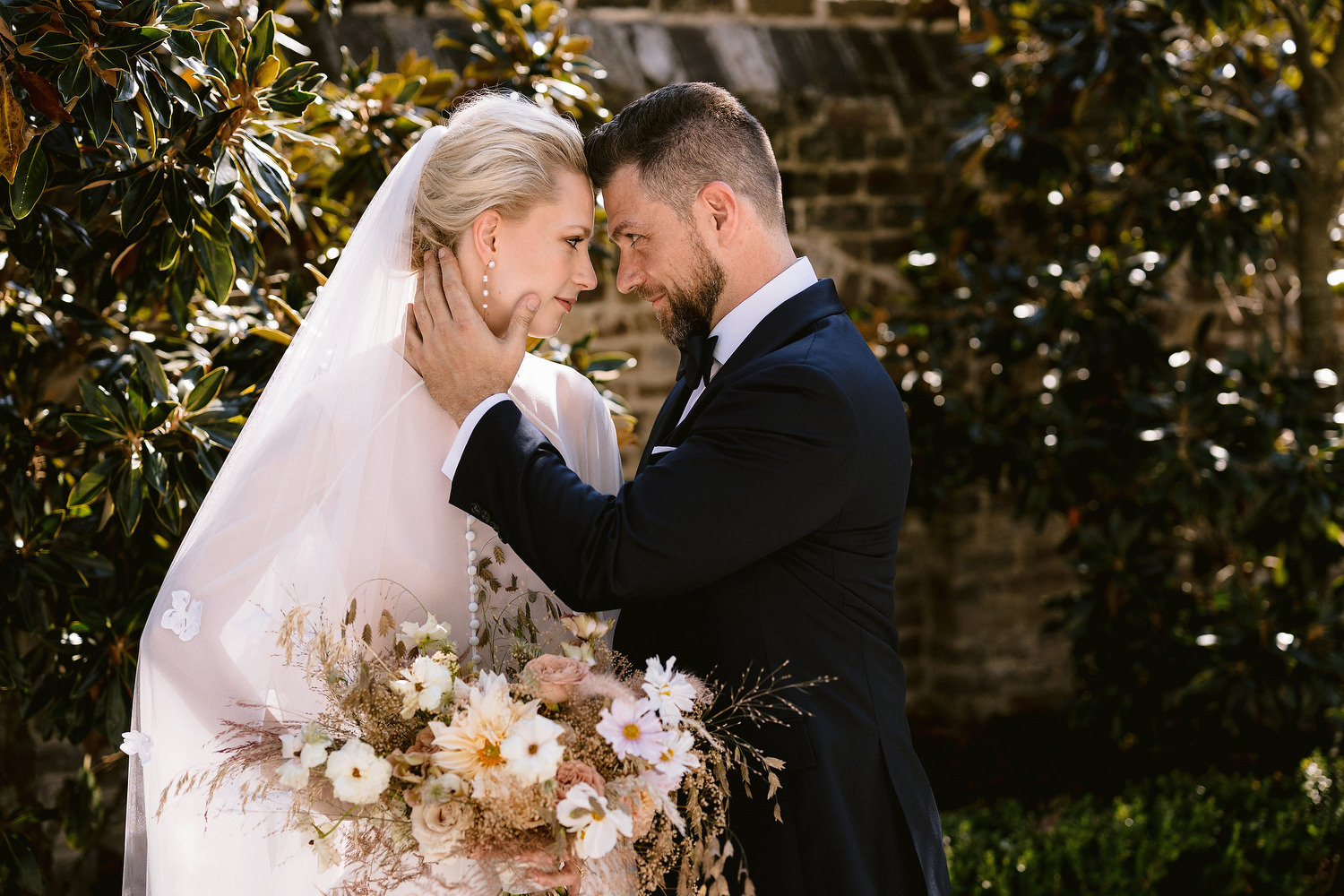 bride and groom smiling