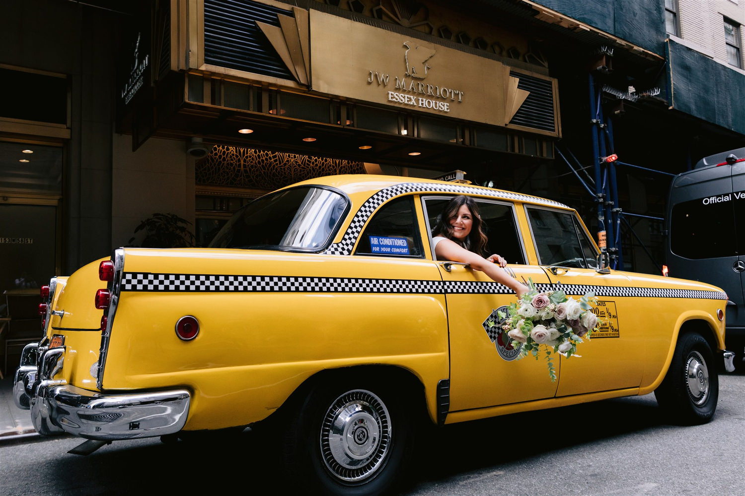 old new york, new york wedding, jenny fu, bride, classic new york wedding, beautiful bride looks out car window, film cars New York, checker cab, Manhattan wedding
