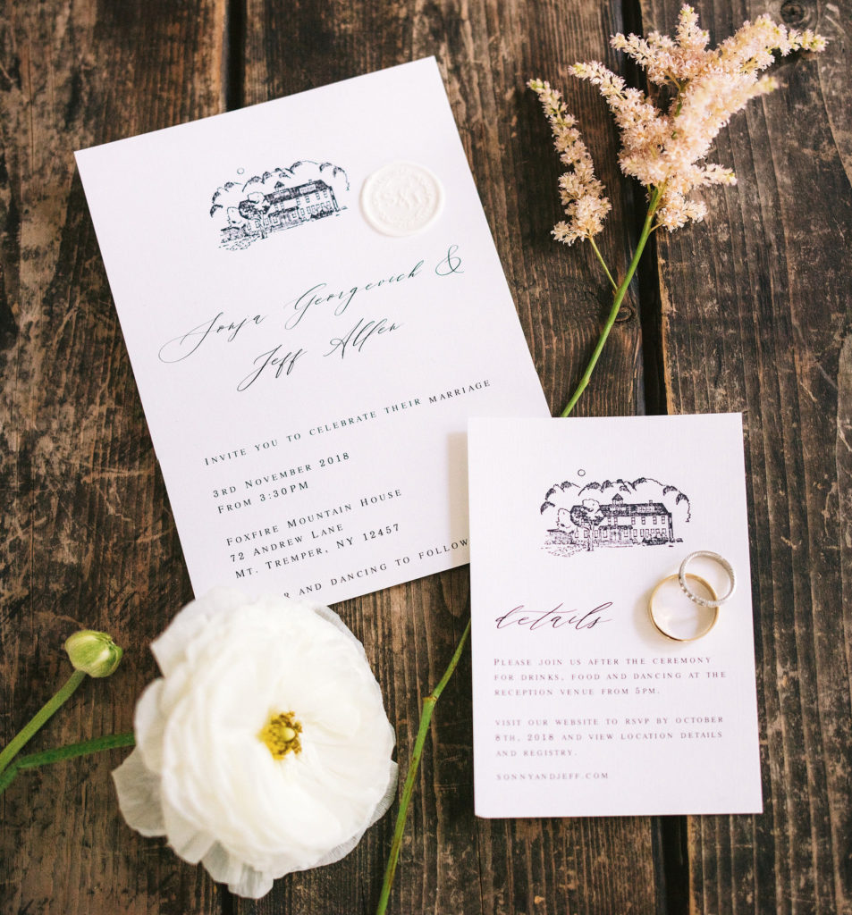 Elegant wedding invitations created by the bride, using Paper Presentation as a printer. Displayed with florals from the wedding day and the couple's rings. Editorial Wedding at Firefox Mountain House in Upstate New York.