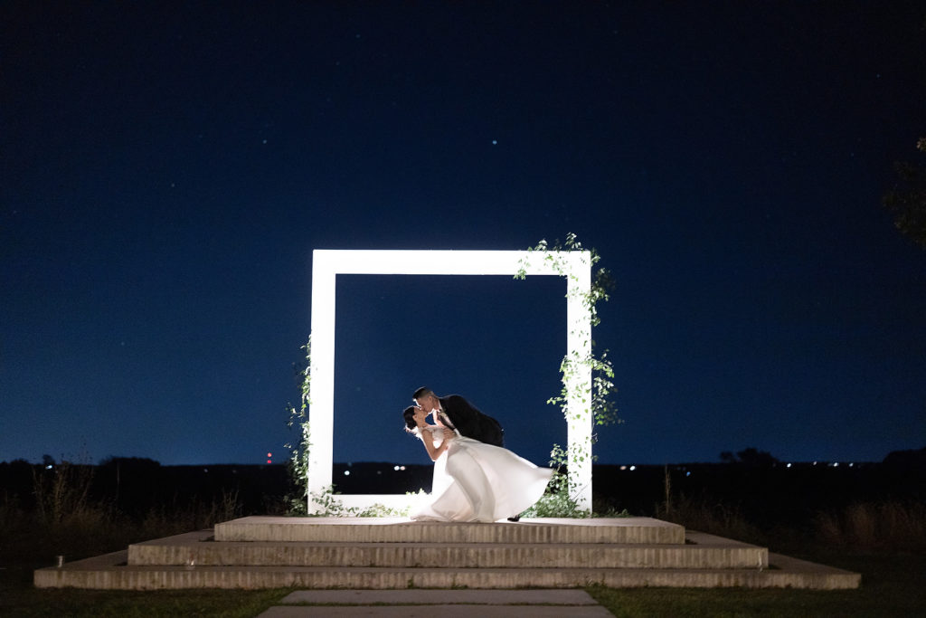 Bride and groom kissing
