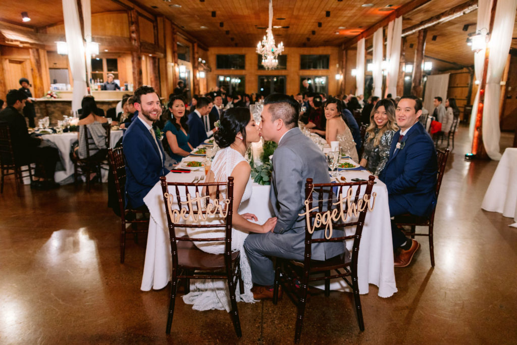 Bride and groom kissing
