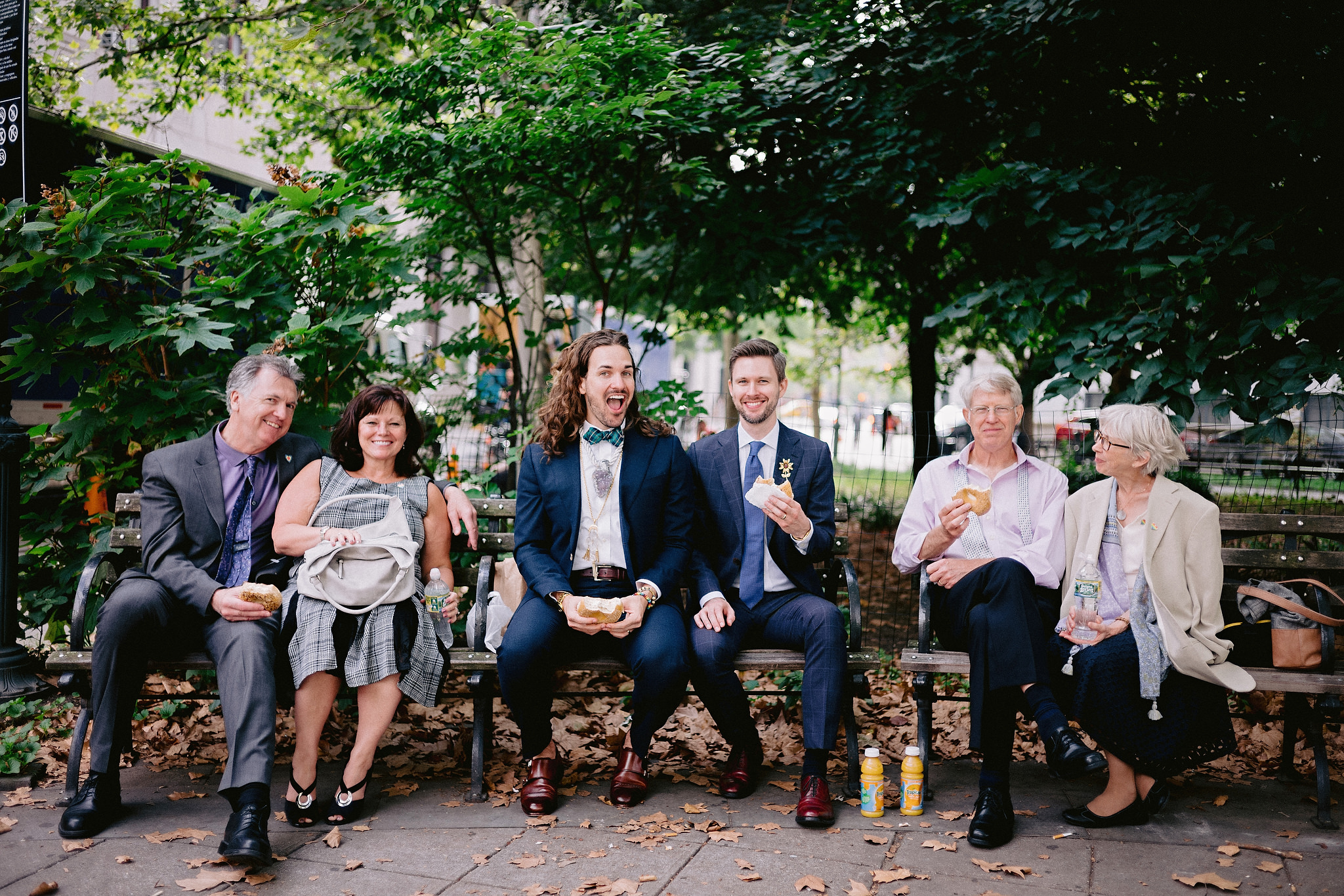 Family celebrating their sons marriage, same sex