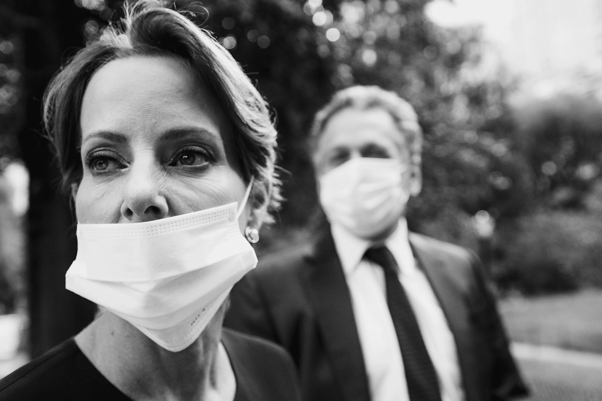 Wedding guests wearing face masks to reduce the spread of COVID19