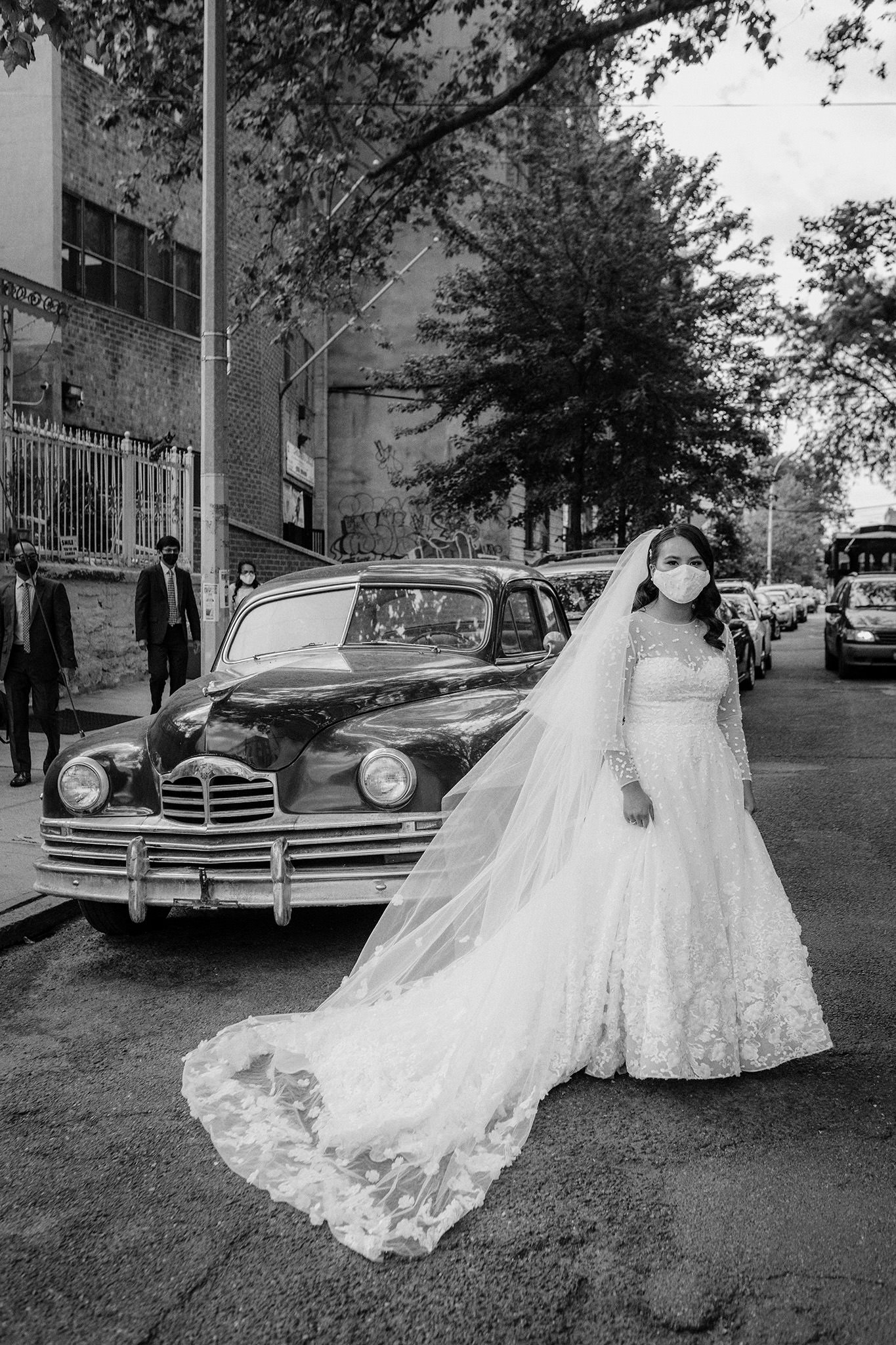Bride on her wedding day wearing a mask during COVID19 pandemic in 2020.