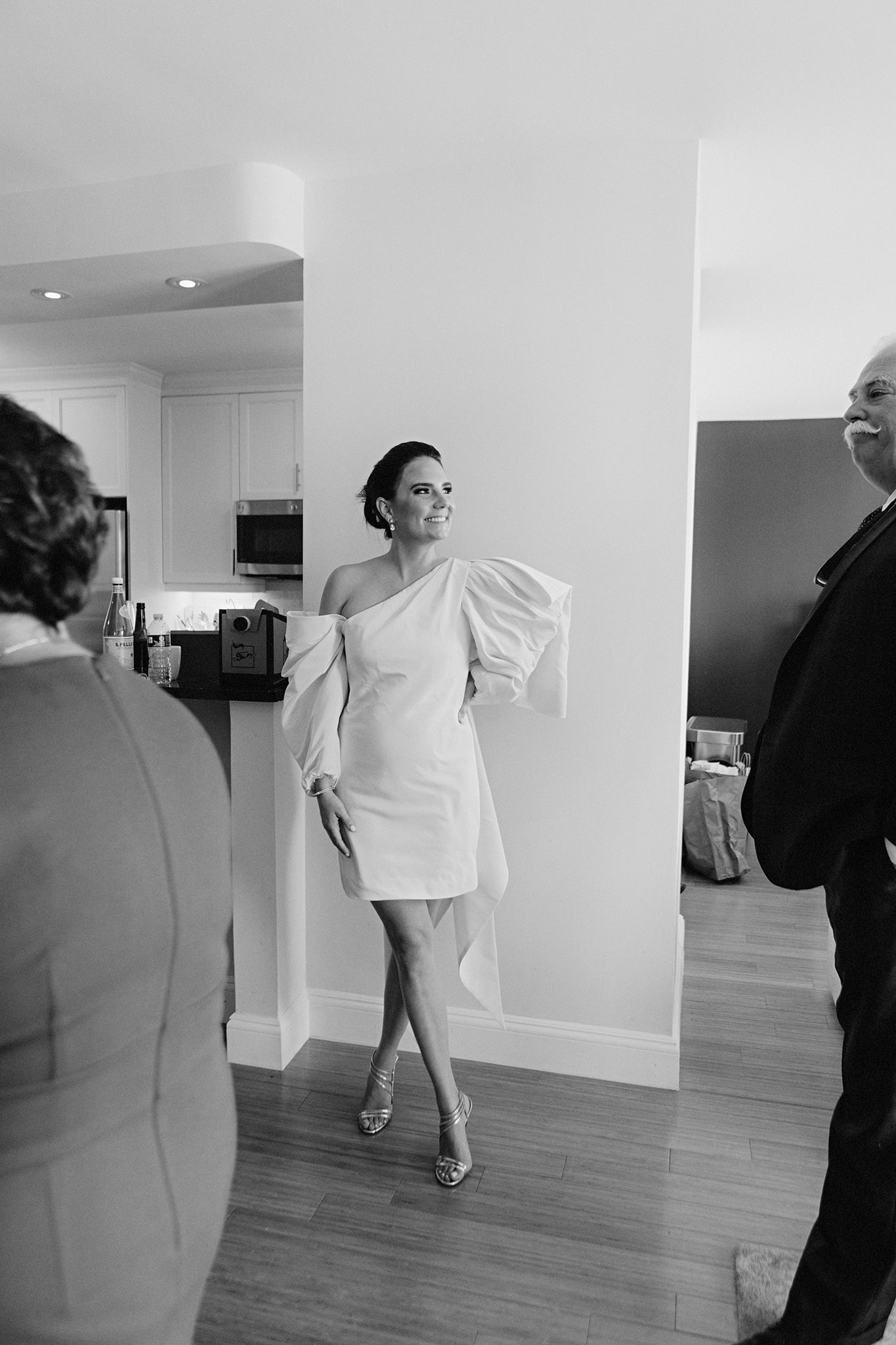 Bride smiling on her wedding day wearing Carolina Herrera on Upper West Side apartment in NYC