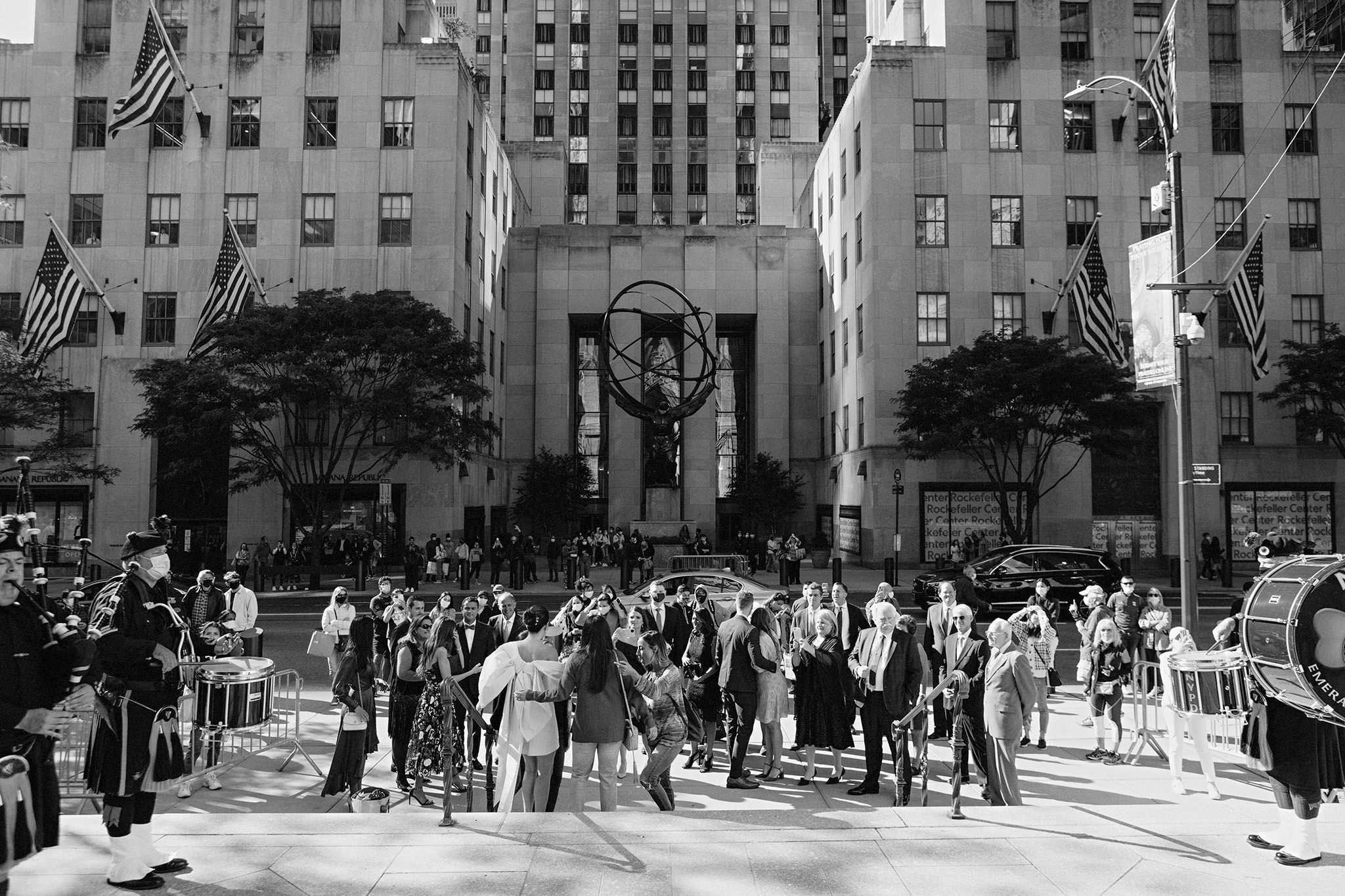 Street view of fifth avenue from St. Patrick's Cathedral after wedding ceremony in NYC. People wearing masks due to COVID19 pandemic.