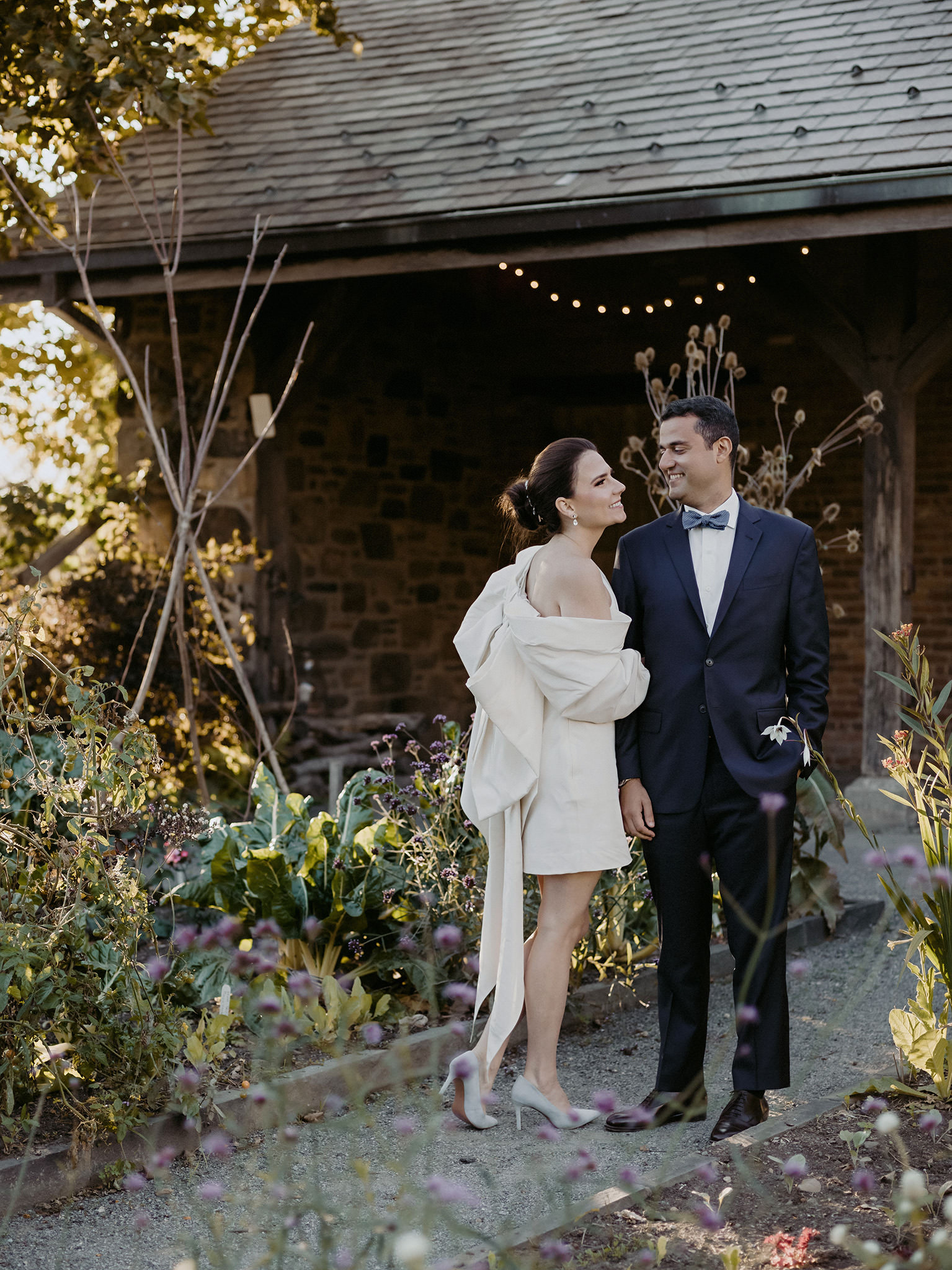 Man and wife looking into each others eyes at the Blue Hill at Stone Barns