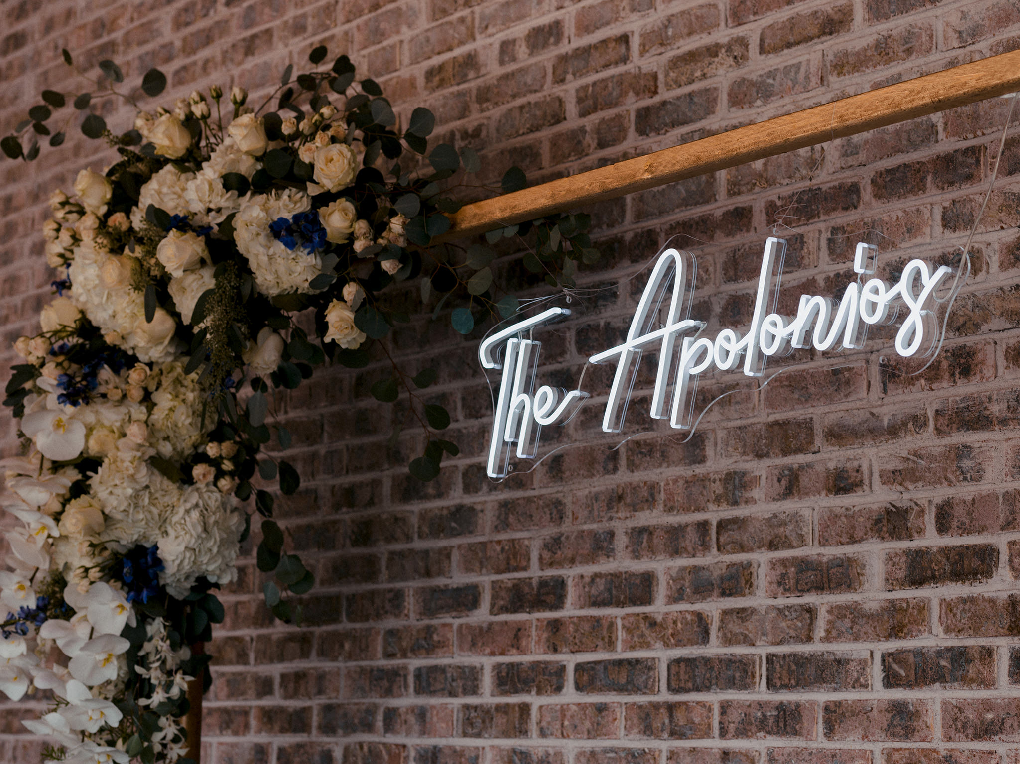 Neon sign showing the bride and grooms last name