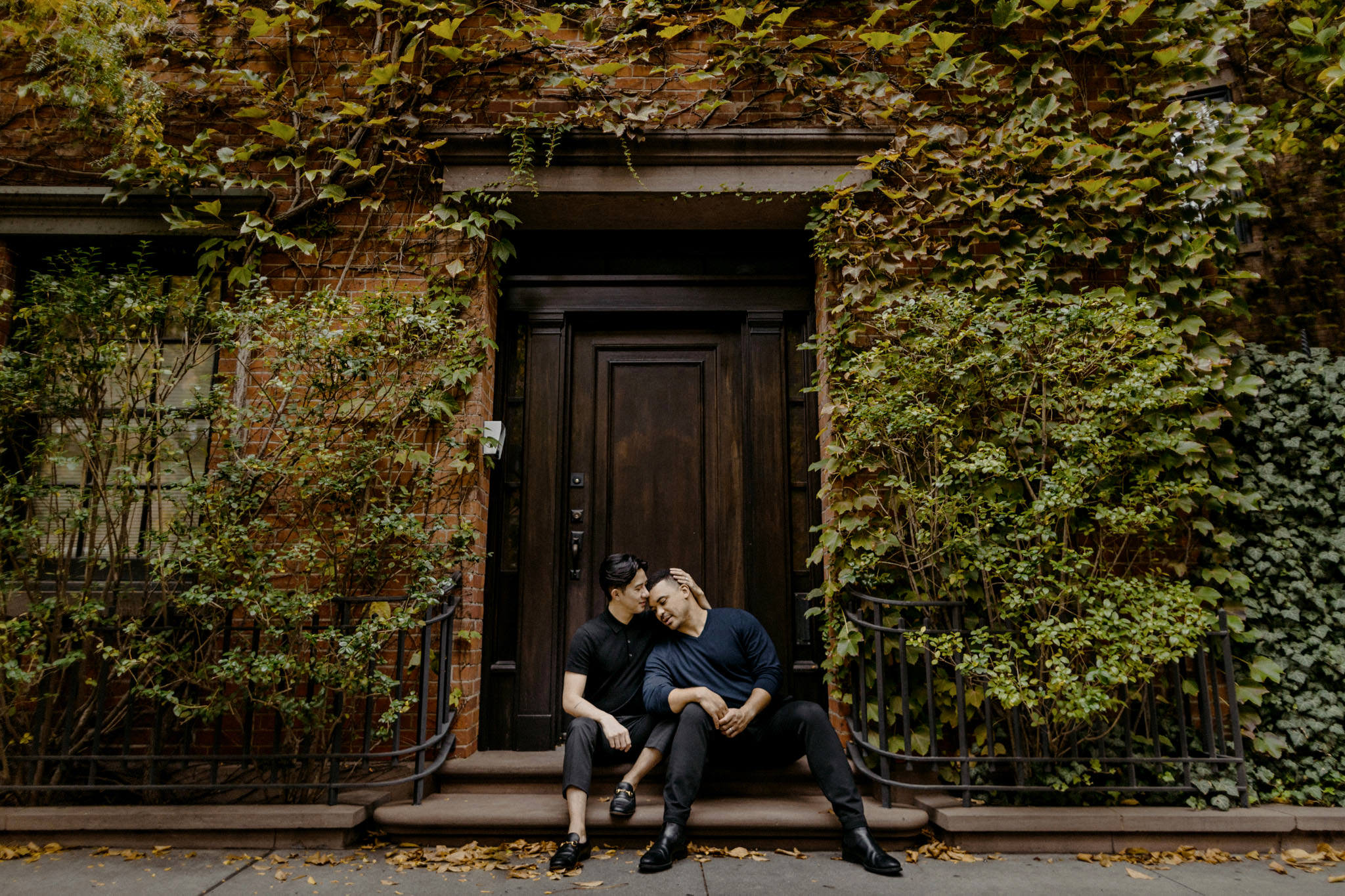 Gay husbands hold hands in the West Village NYC