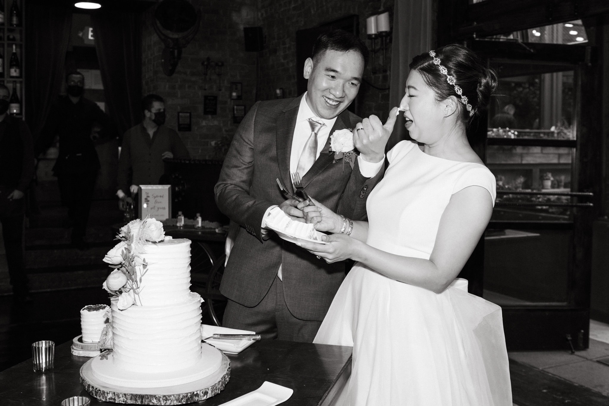 Husband feed his wife cake at MyMoon