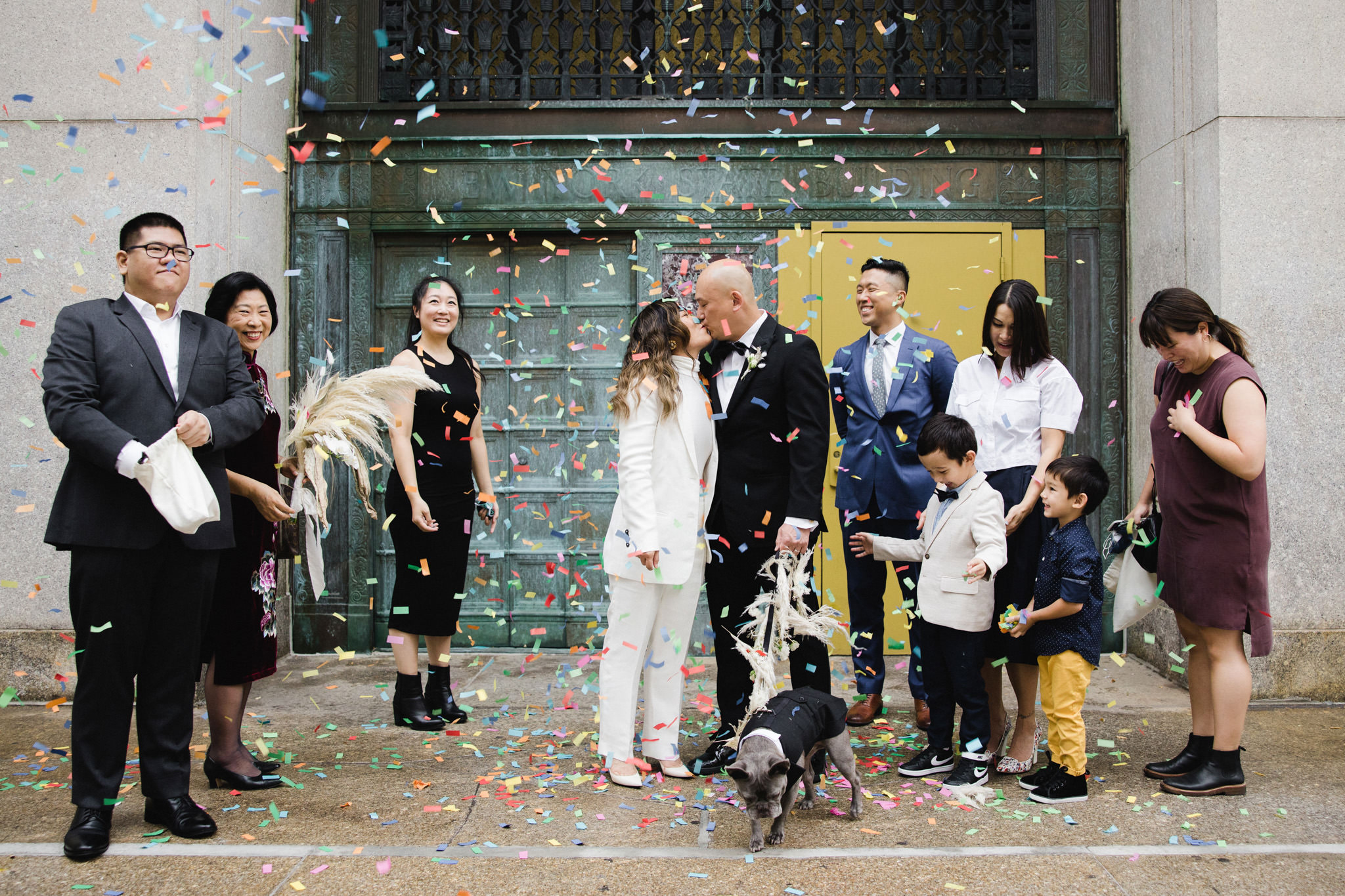 Bride and groom kiss on their wedding day in New York City