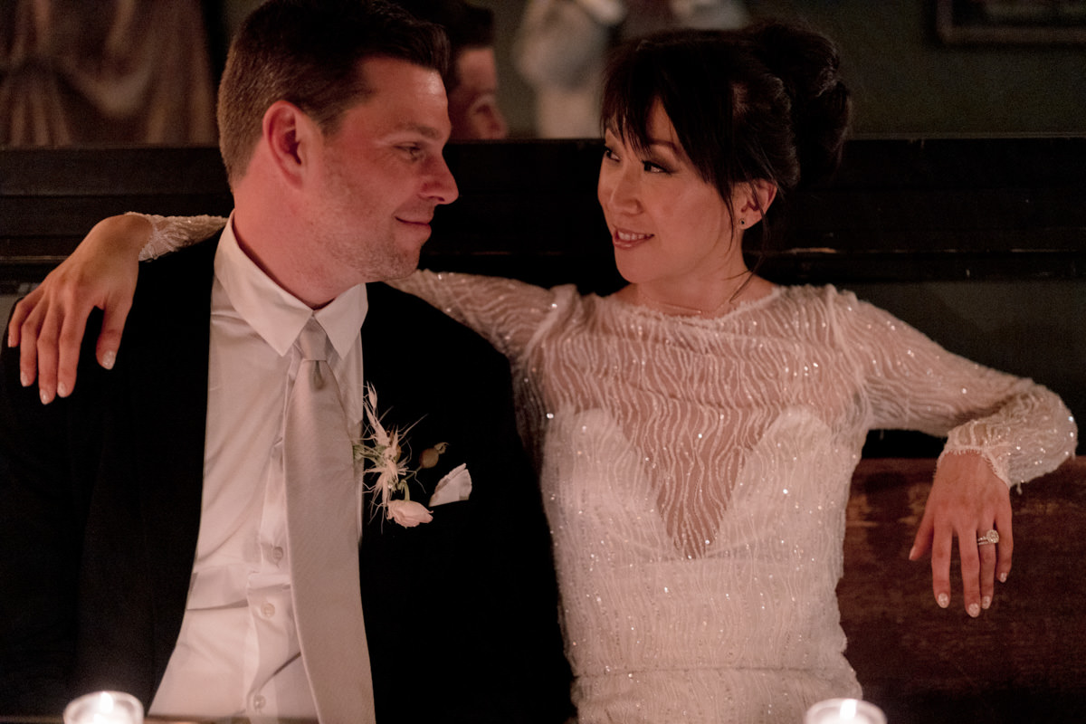 An NYC bride looks lovingly into her grooms eyes