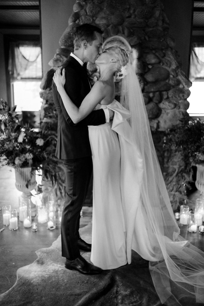 A bride kissing her groom on their wedding day