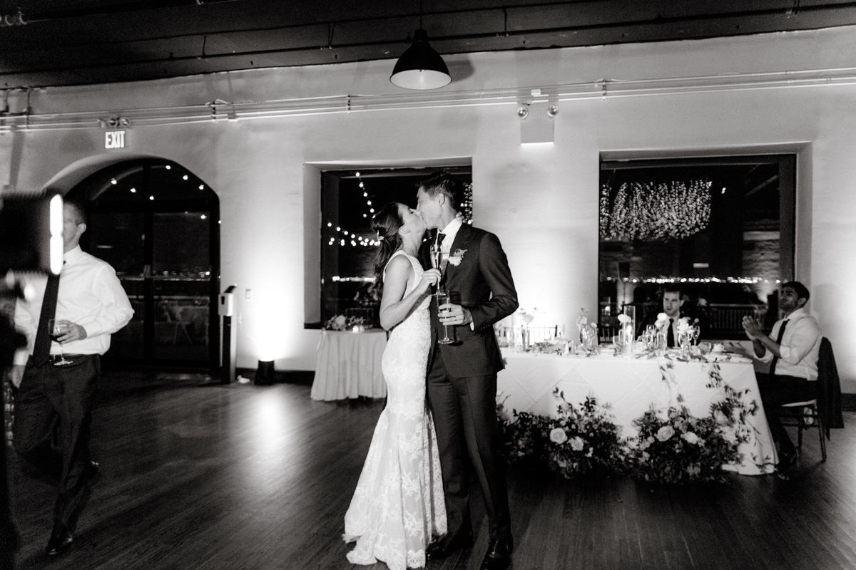 Bride and groom share a kiss on their wedding day